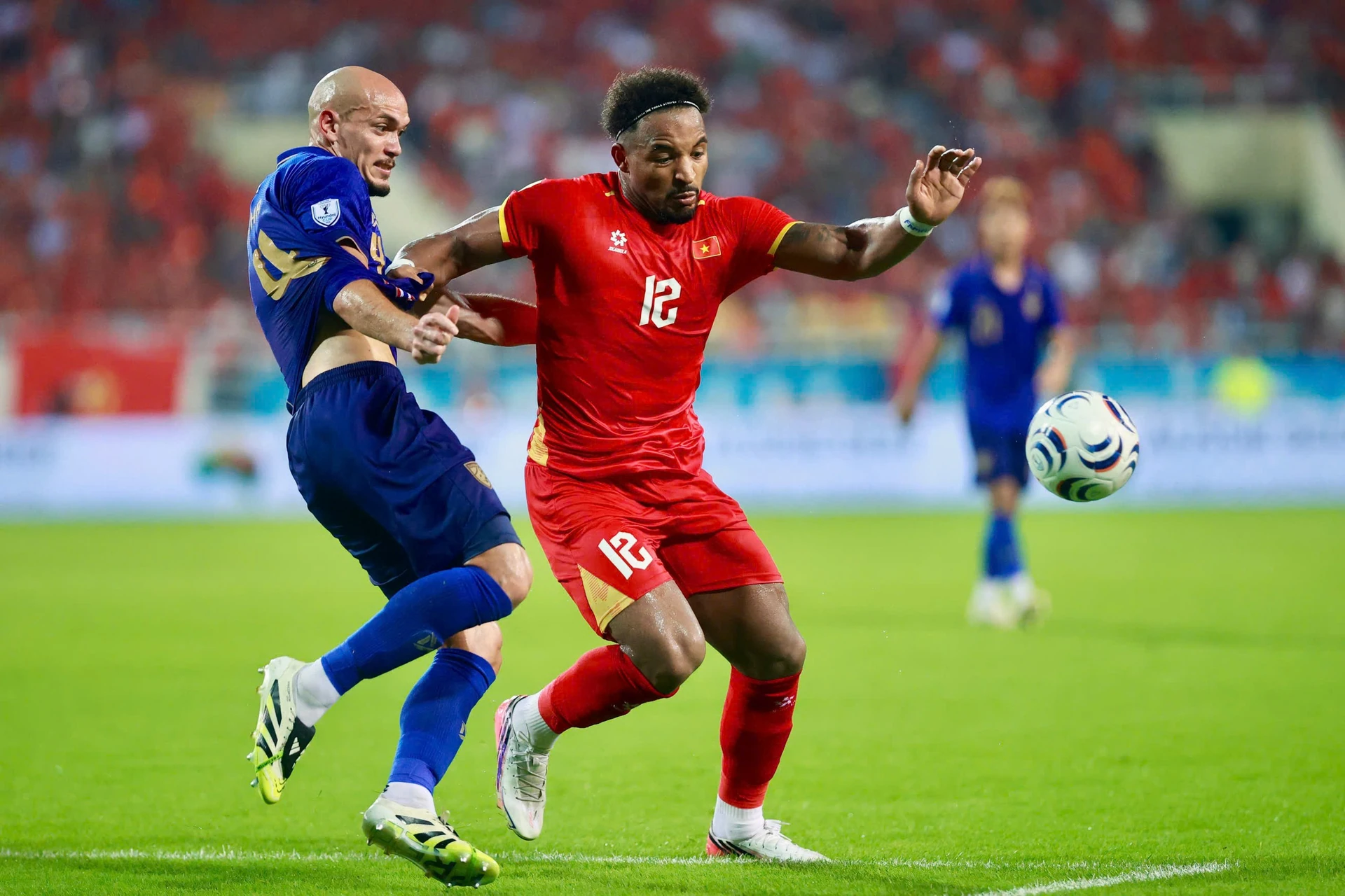 Vietnam national team players in red compete for the ball in an earlier match, file photo