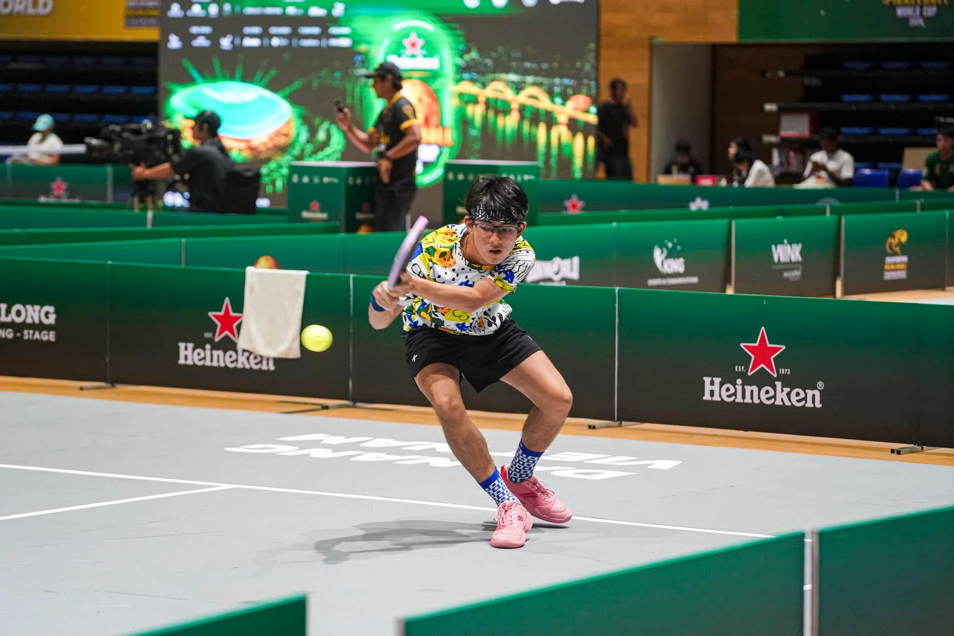 Rex Thais plays pickleball.