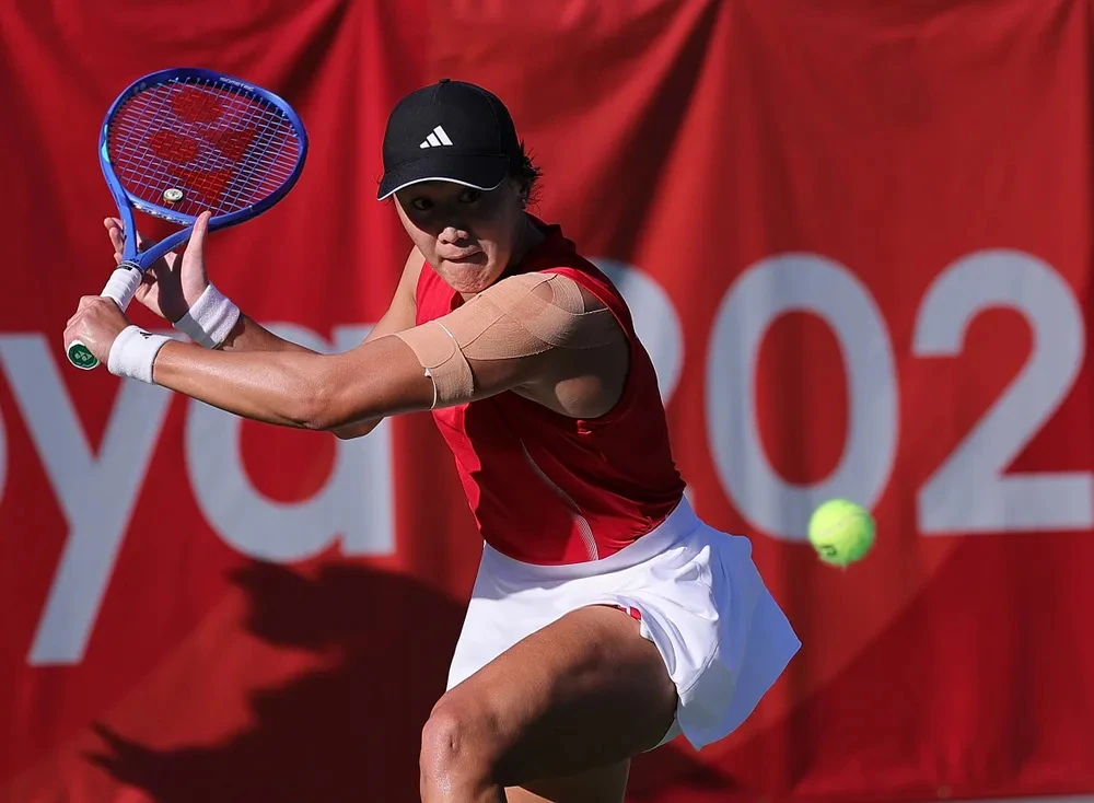 Wang Xiyu in action; the gold-medal match against Zhang Shuai had not taken place at the report's cutoff.