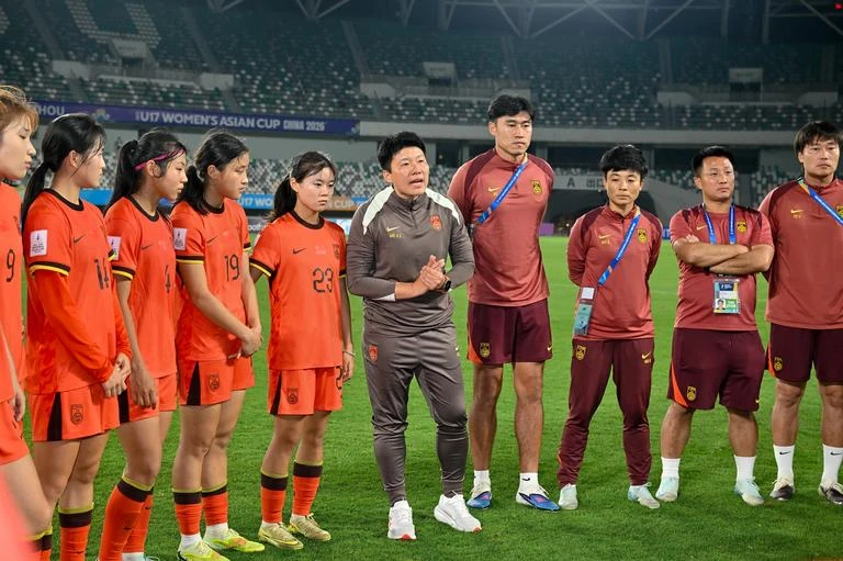 Ma Xiaoxu addresses China U17 Women after an Asian Cup match against DPR Korea.