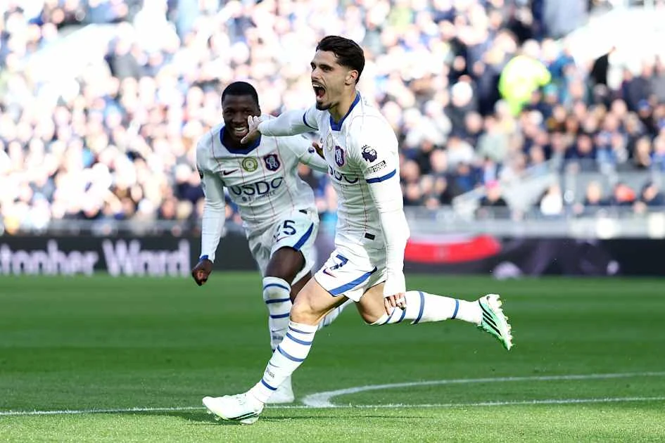 Pedro Neto celebrates scoring for Chelsea against Everton.