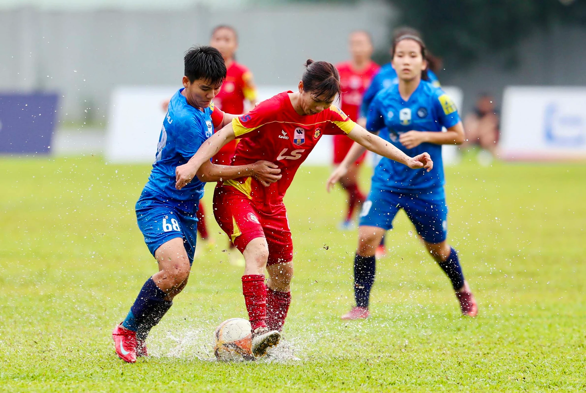 File photo: TP.HCM women's club players (red) contest the ball at the 2026 national championship