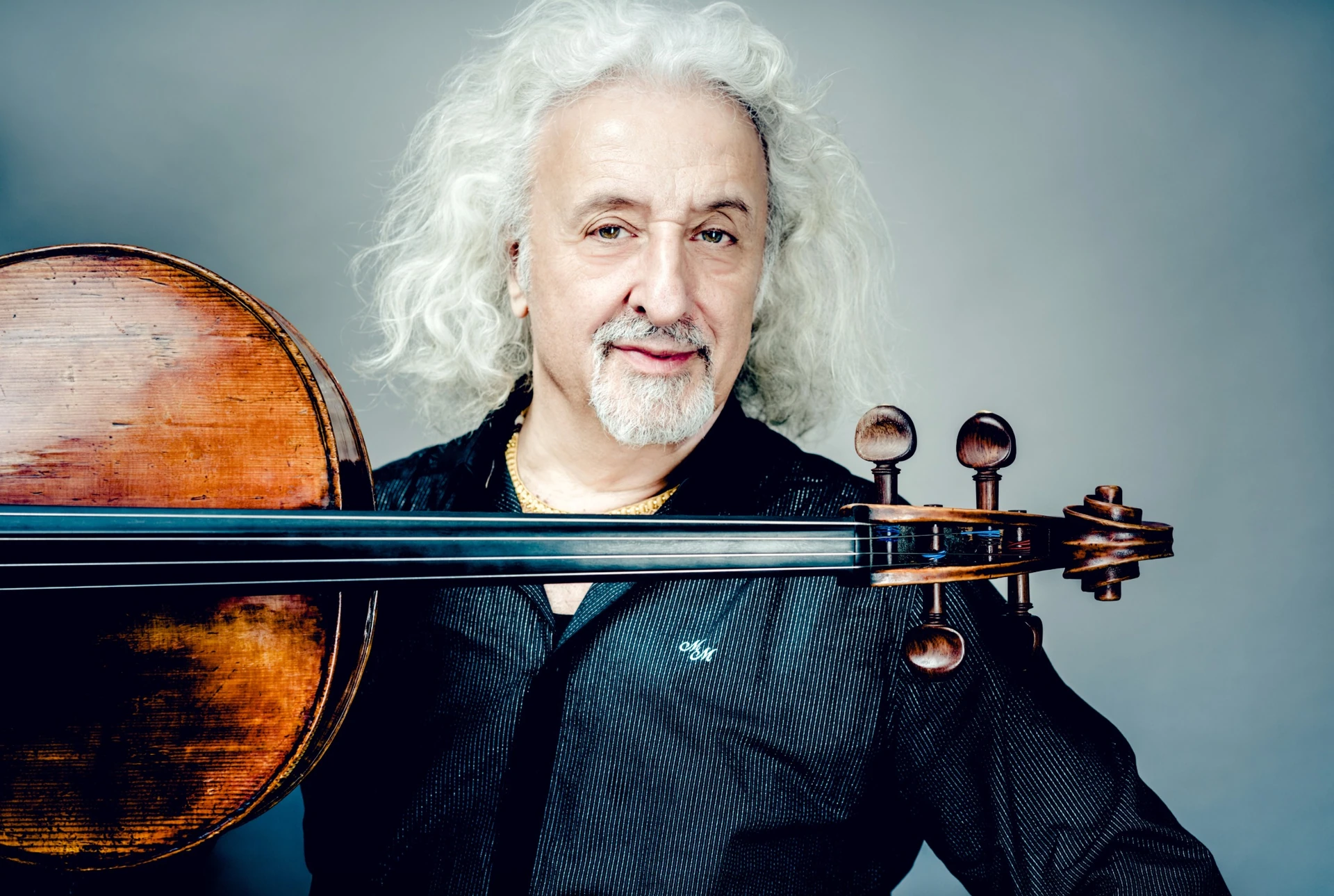 File photo: Cellist Mischa Maisky posing with his cello