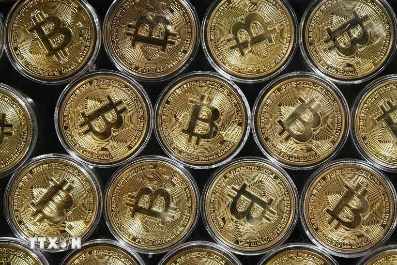 File photo: Physical bitcoin tokens arranged side by side