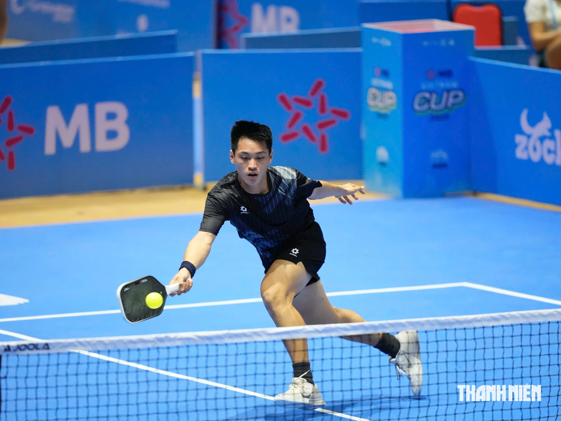 Trương Vinh Hiển playing pickleball, in a Thanh Niên file photograph.